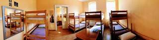 Хостелы Krone Hostel Ужгород Спальное место на двухъярусной кровати в общем номере для мужчин и женщин-10